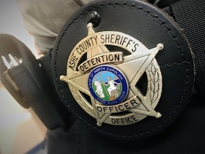 A law enforcement badge, close up.
