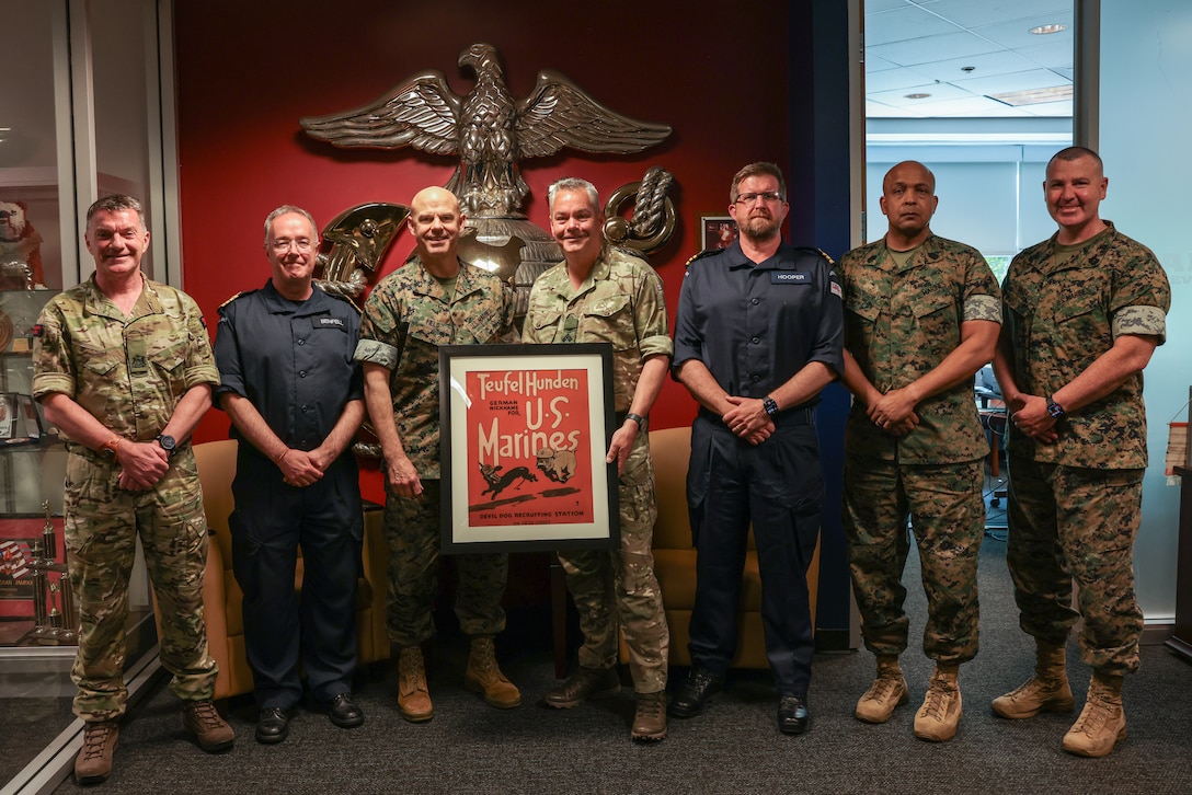 U.S. Marines, British Royal Marines and Royal Sailors meet for the United Kingdom Armed Forces Recruiting Delegation at Marine Corps Recruiting Command on Marine Corps Base Quantico, May 11, 2026. The British Delegation and the United States Marine Corps share a long-standing partnership. The Royal Marines and the Royal Sailors visited MCRC to discuss recruiting and retention efforts between the two organizations. (U.S. Marine Corps photo by Cpl. Hana Lathrop)