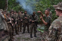 Suriname Armed Forces Sgt. First Class Alvaro Ronoreso teaches survival techniques to U.S. Soldiers and Airmen, as well as Suriname Armed Forces members, during Operation Rumble in the Jungle at Ayoko, Suriname, April 17, 2026.