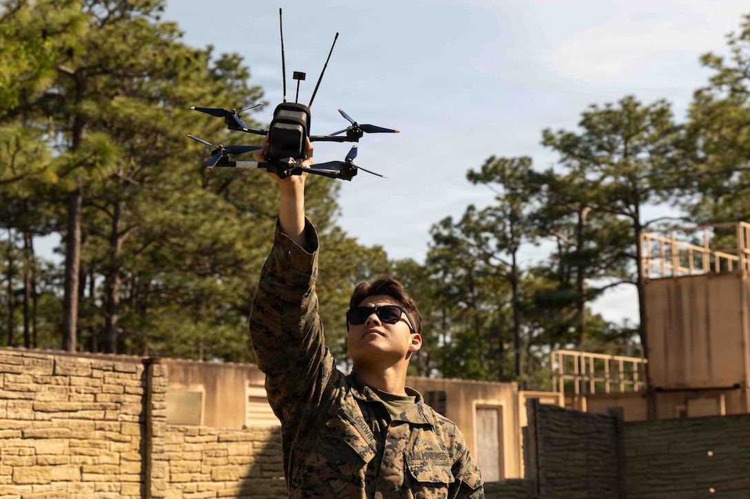 U.S. Marine Corps Lance Cpl. Colton Godwin, a machine gunner with 3rd Battalion, 2nd Marine Regiment, 24th Marine Expeditionary Unit, prepares a Neros Archer first-person view drone for flight during a FPV drone course on Marine Corps Base Camp Lejeune, North Carolina, May 4, 2026. Hosted by 2nd Marine Division, the course equipped Marines of the 24th MEU with advanced FPV piloting skills to enhance squad-level reconnaissance and precision strike capabilities. (U.S. Marine Corps photo by Lance Cpl. Allison White)