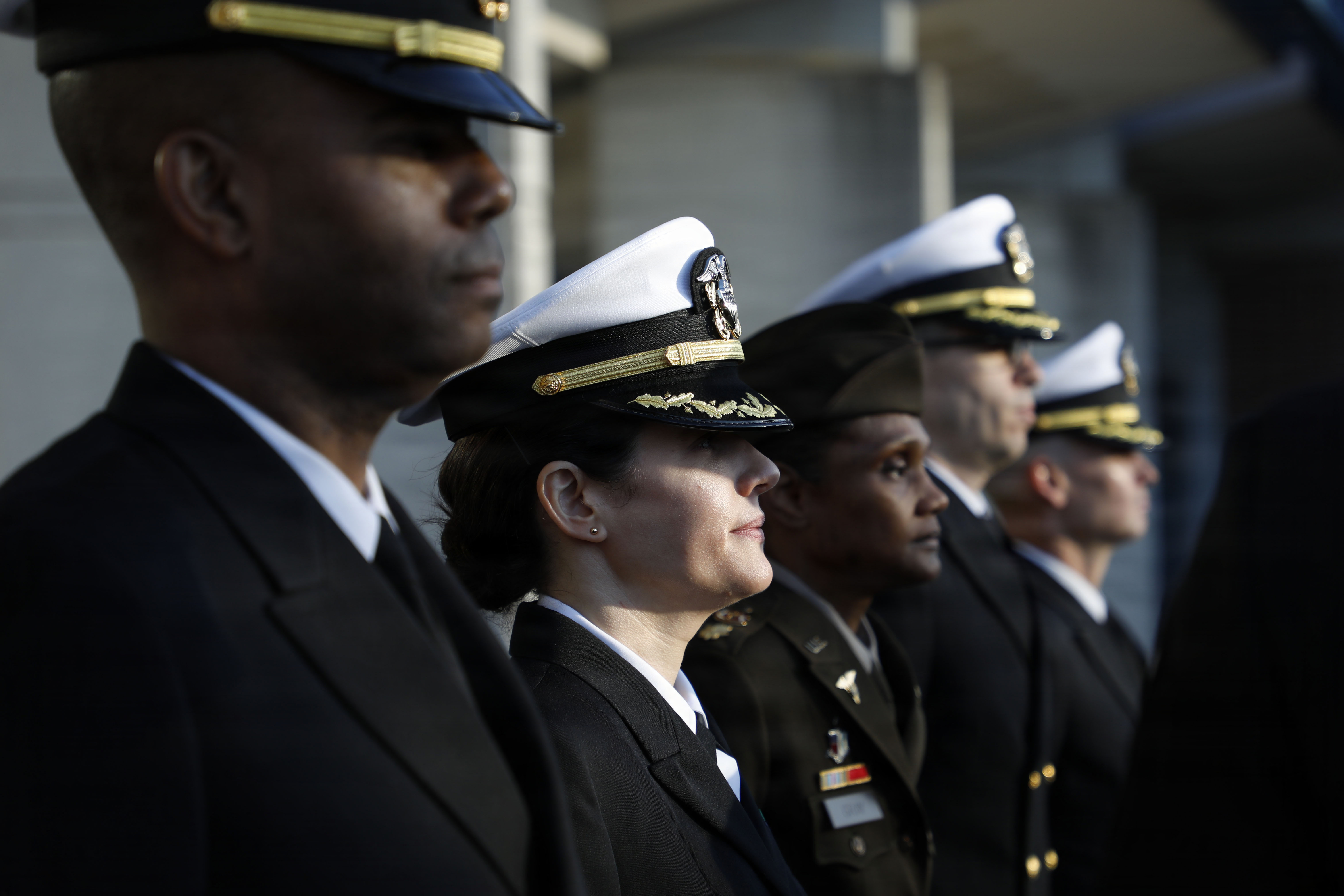 Sailors and Soldiers assigned to Naval Medical Research Command (NMRC) take part in a uniform inspection to maintain military discipline, order and appearance.