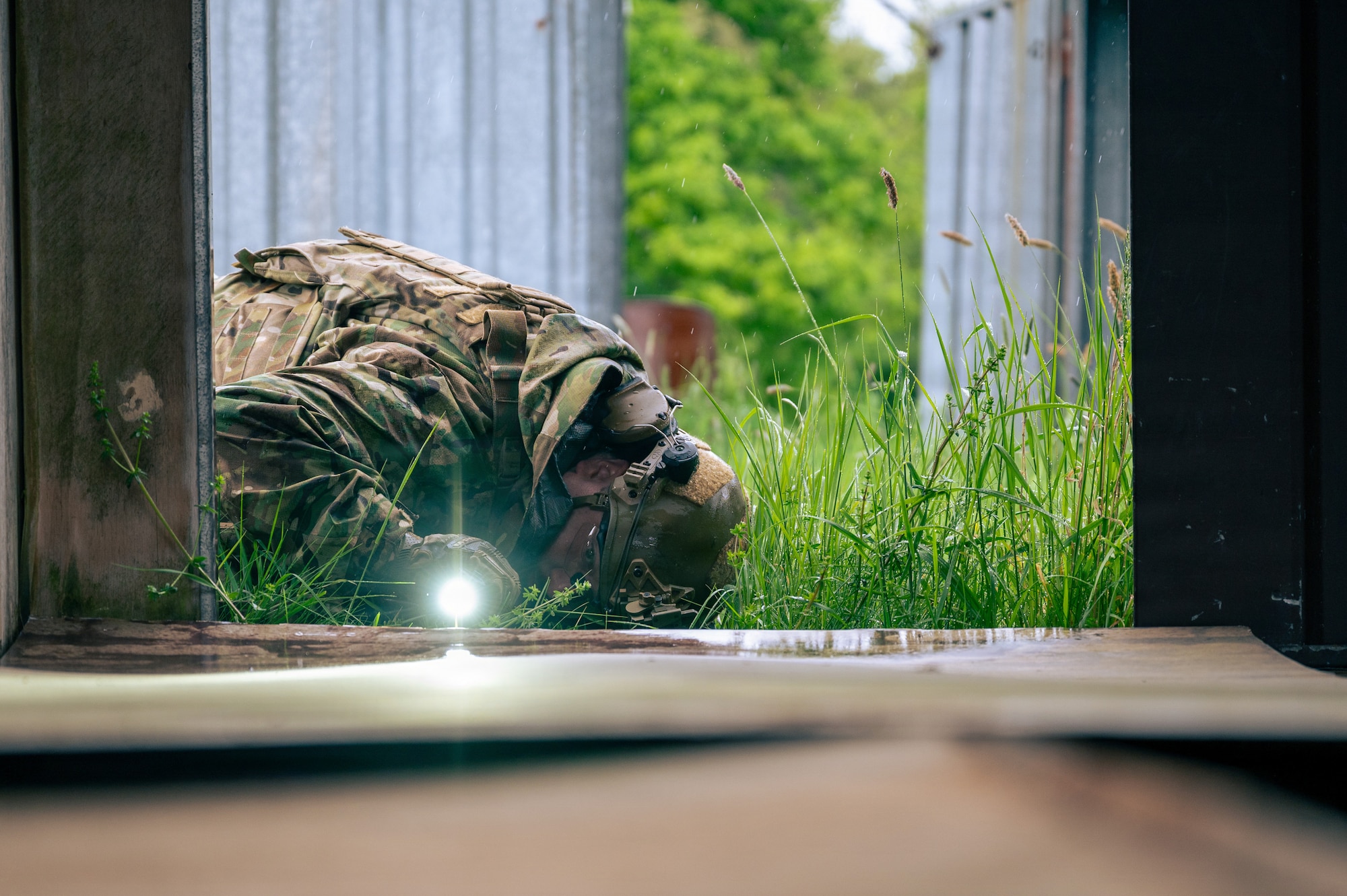 U.S. Air Force Staff Sgt. Taylor Lanteine, 786th Civil Engineer Squadron Explosive Ordnance Disposal flight team leader, checks for concealed explosive devices