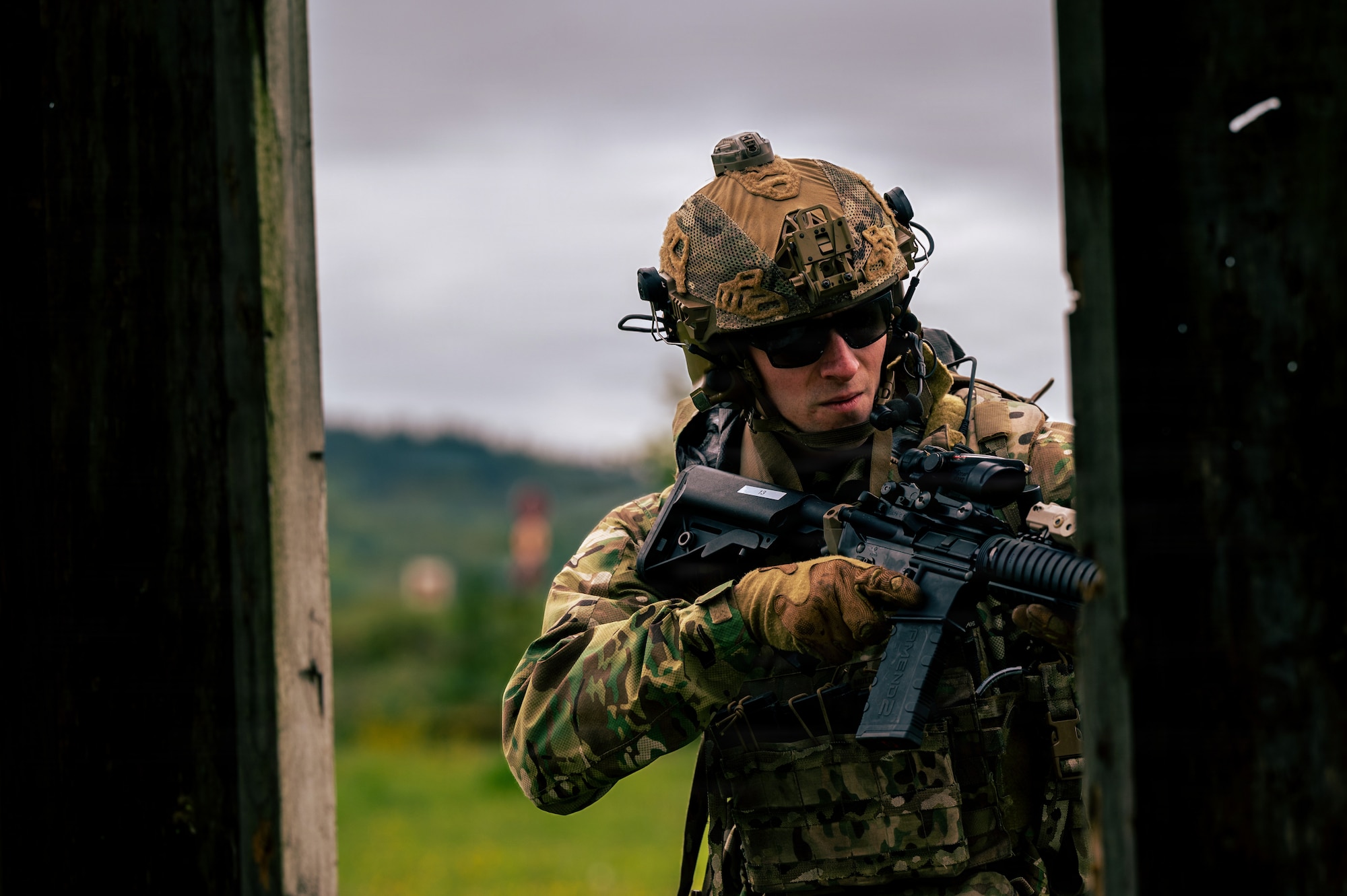 U.S. Air Force Staff Sgt. Anthony Granata, 786th Civil Engineer Squadron Explosive Ordnance Disposal flight team leader, simulates clearing a shelter