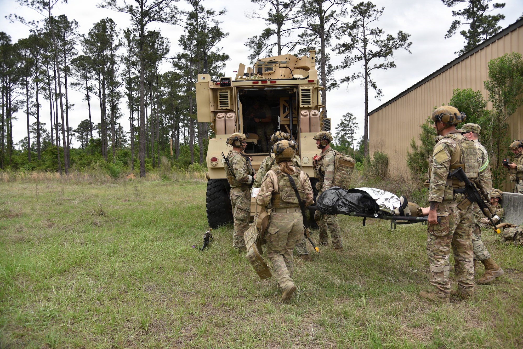 U.S. Air Force Airmen assigned to the 820th Base Defense Group evacuate a simulated patient to a vehicle during tactical combat casualty care training at Moody Air Force Base, Georgia, April 8, 2026.