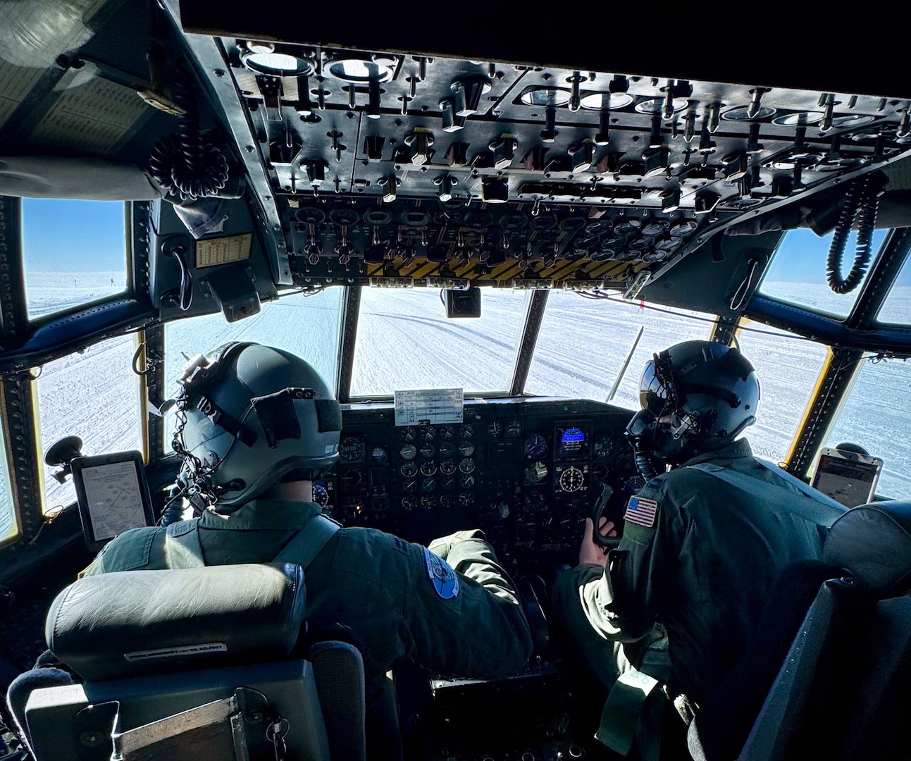 Pilots from the 109th Airlift Wing land an LC-130 Hercules aircraft on a ski landing area, also known as a “skiway," Greenland, May 9, 2024.