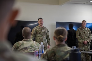 Lt. Col. Daniel Peterson, 377th Security Forces Squadron commander, right, and Senior Master Sgt. Gavin Saiz, 377 SFS senior enlisted leader, congratulate graduates of the inaugural Entry Controller Leaders Course during a graduation ceremony at Kirtland Air Force Base, New Mexico, May 8, 2026. The course provides Security Forces personnel with advanced supervisory training and integrated defense instruction to prepare them for leadership roles overseeing installation access control points and frontline security operations. (U.S. Air Force photo by Senior Airman Donnell Schroeter)