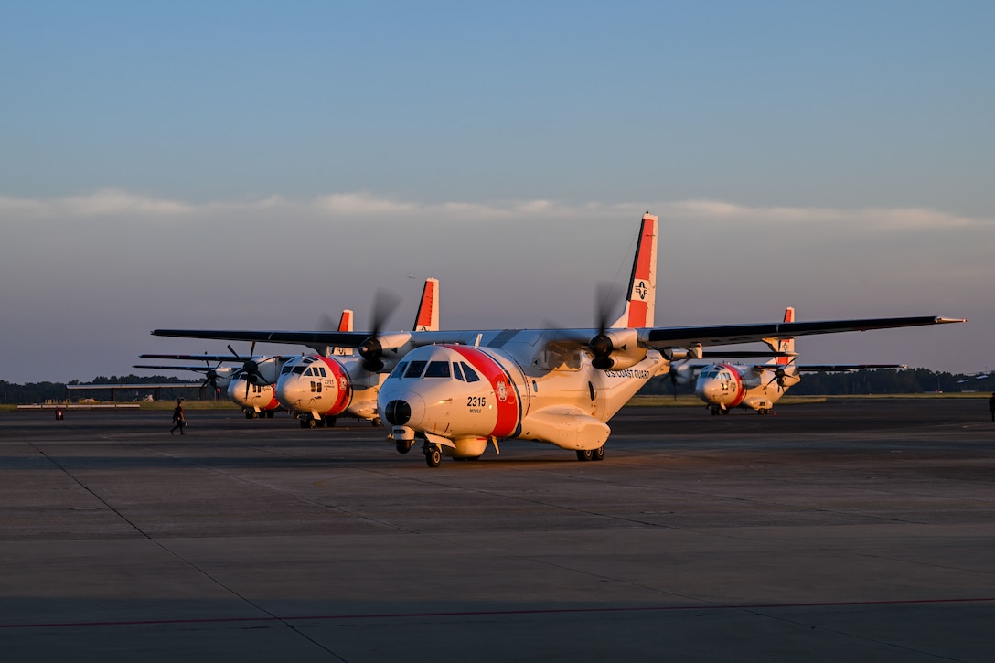 Coast Guard crews from Air Station Clearwater pre-stage assets at Coast Guard Aviation Training Center Mobile to assist post-Hurricane Milton, in Mobile, Alabama, Oct. 7, 2024. Following the hurricane’s departure, Coast Guard crews stand ready for search and rescue and will assess ports and waterways to ensure mariners can transit safely through the area. (U.S. Coast Guard photo by Petty Officer 1st Class Riley Perkofski)