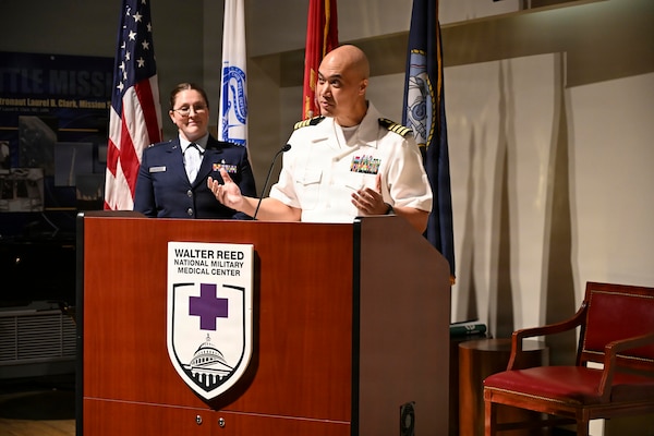 BETHESDA, Md. (May 8, 2026) Capt. Robert Cuento, the chief nursing officer assigned to Navy Medicine Readiness and Training Command (NMRTC) Bethesda gives the opening remarks at “The Power of Nurses” award ceremony during Nurses Week at Walter Reed National Military Medical Center, May 8, 2026. NMRTC Bethesda mission is to maximize warfighter performance through optimized medical readiness tailored to operational requirements; enhance the readiness of the medical force to sustain expeditionary medical capability; and train and develop the Navy Medicine Force. (U.S. Navy photo Mass Communication Specialist Second Class Alec Kramer)