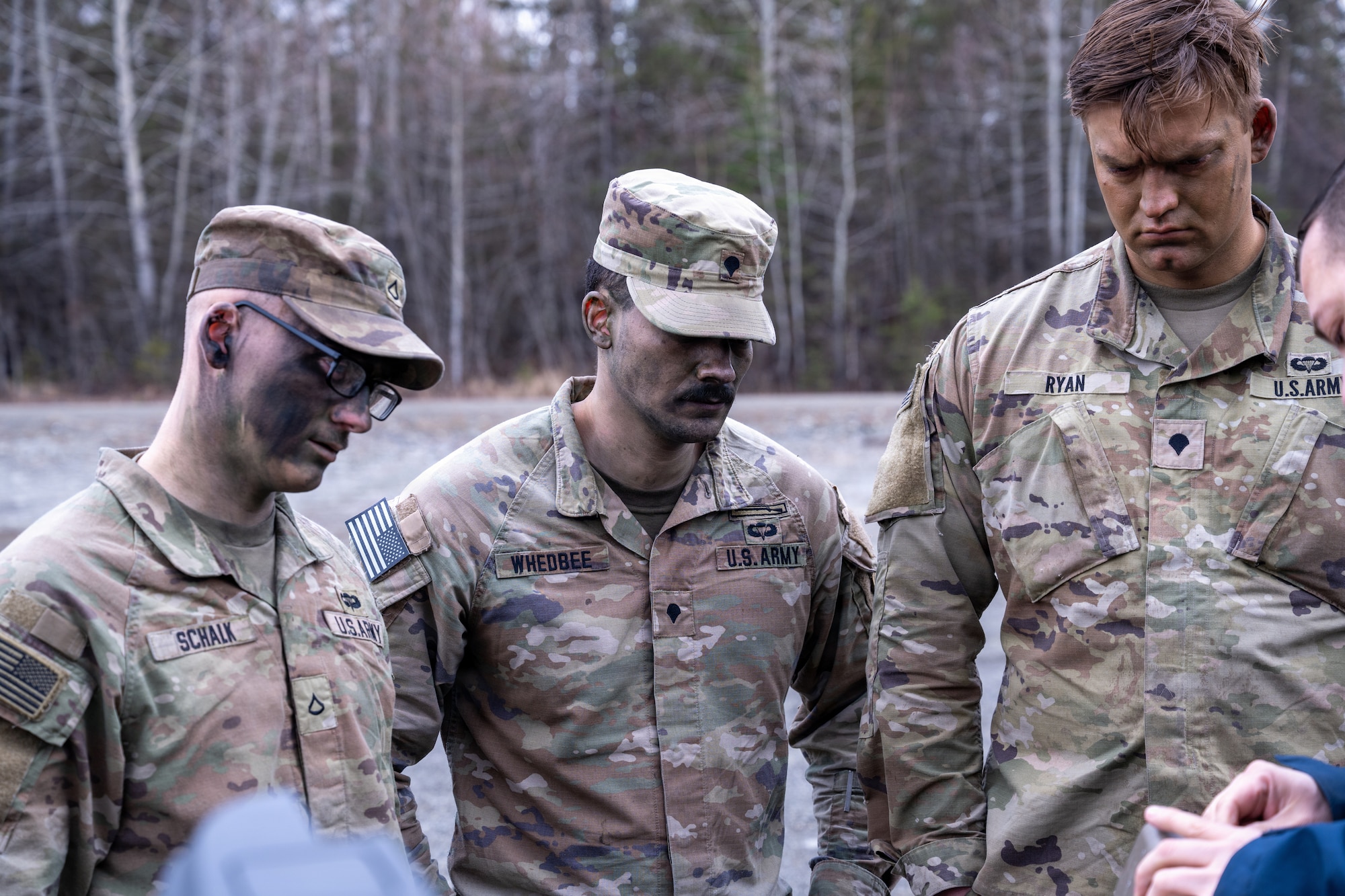 U.S. Army Pfc. Matthew Shalk, Spc. Roberto Whedbee and Spc. Chase Dowden, asssigned to A Company, 3rd Battalion, 509th Parachute Infantry Regiment, 11th Airborne Division, recieve familiarization training on the Dronebuster on Joint Base Elmendorf-Richardson, Alaska, May 7, 2026. The Dronebuster is a handheld jammer that provides a localized electronic warfare capability, allowing soldiers to disrupt and neutralize unmanned aerial systems at the tactical level. (U.S. Air Force photo by Airman 1st Class Theodore Gowdy)