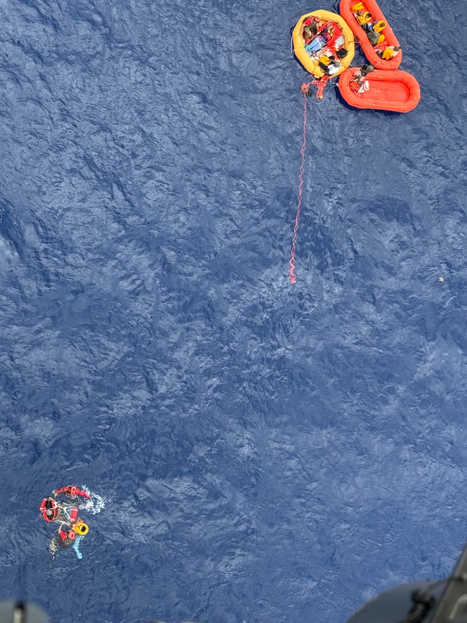 Pararescuemen rescue people in open water