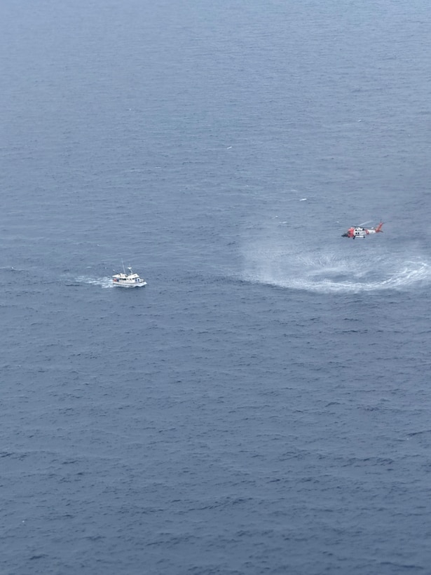 A Coast Guard Air Station Clearwater helicopter aircrew medevacs the captain of a fishing vessel 122 miles off Longboat Key, Florida, May 12, 2026.