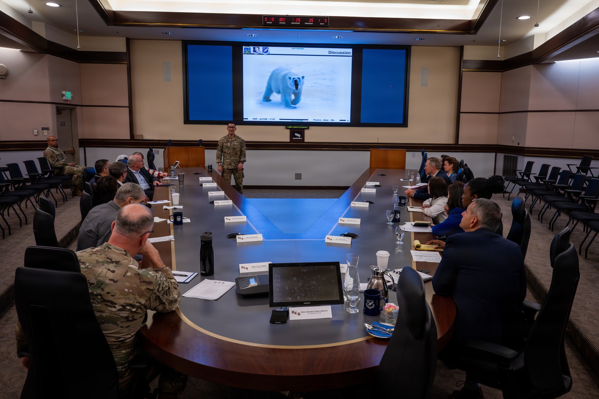 Members from the Business Executives for National Security attend a briefing by U.S. Air Force Brig. Gen. Matthew Komatsu, Air National Guard Assistant to the Commander, Alaskan Command, and Alaska Air National Guard, Chief of Joint Staff, during an installation visit at Joint Base Elmendorf-Richardson, Alaska, May 4, 2026. BENS, along with key members on the installation, discussed the importance of the mission of the Alaskan NORAD Region, Alaskan Command and the Eleventh Air Force. (U.S. Air Force photo by Senior Airman Tala Hunt)