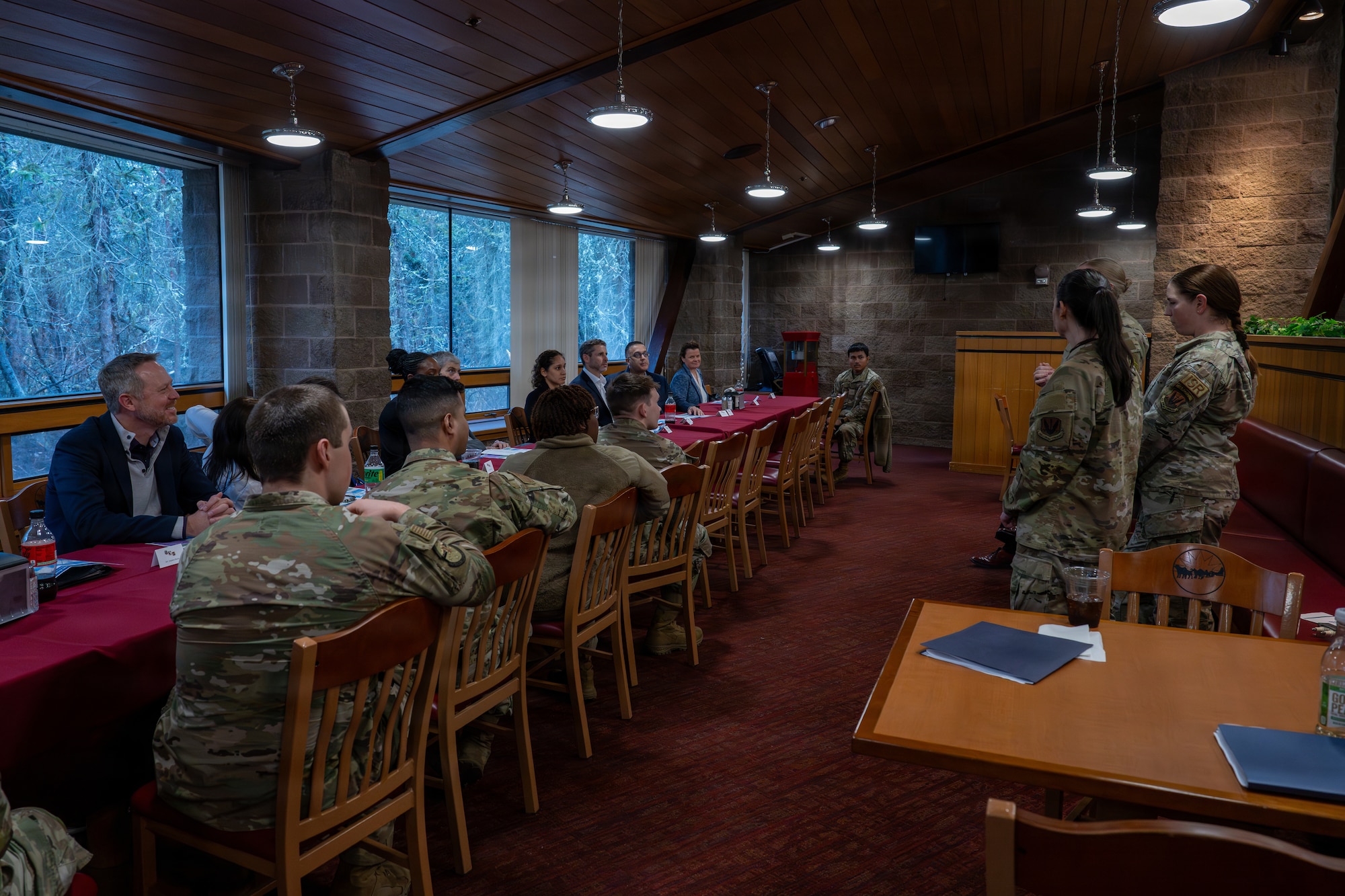 Members from the Business Executives for National Security receive a brief during an installation visit at the Iditarod Dining Facility, Joint Base Elmendorf-Richardson, Alaska, May 4, 2026. The working lunch was an opportunity for both parties to build camaraderie and ask questions about day-to-day mission requirements. (U.S. Air Force photo by Senior Airman Tala Hunt)
