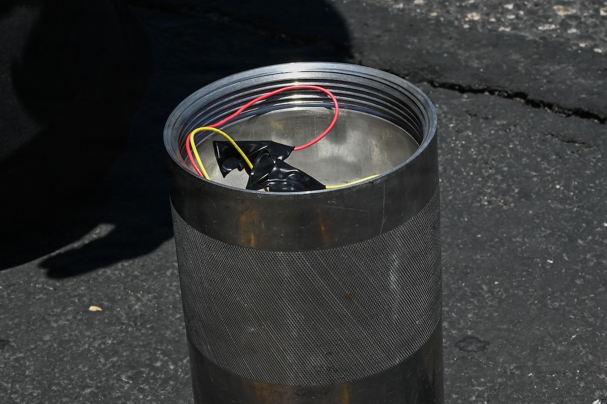 Initiators from simulated bulk explosives rest in a MK 663 blasting cap container during exercise Mosaic Lightning 26-2 at Davis-Monthan Air Force Base, Arizona, May 8, 2026. The container is designed to safely store and transport blasting caps associated with improvised explosive devices in both operational and training environments. High-intensity, realistic exercises like Mosaic Lightning 26-2 push Warfighters to their limits, building the muscle memory and confidence needed for combat. (U.S. Air Force photo by Staff Sgt. Kahdija Slaughter)