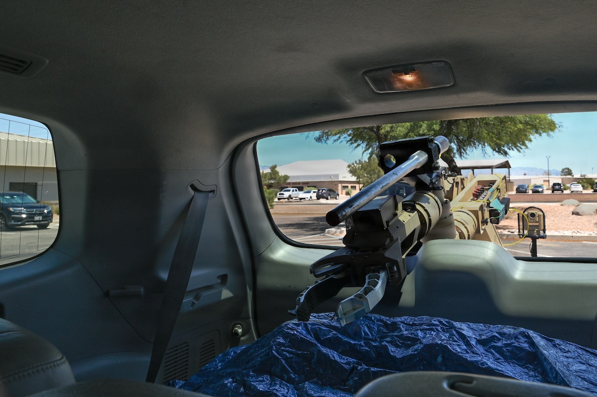 A T7 robotic platform removes a tarp from a simulated vehicle-borne improvised explosive device during exercise Mosaic Lightning 26-2 at Davis-Monthan Air Force Base, Arizona, May 8, 2026. Through relentless training, disciplined execution, and unity of purpose, Air Combat Command’s warriors deliver unmatched readiness and warfighting effectiveness. (U.S. Air Force photo by Staff Sgt. Kahdija Slaughter)