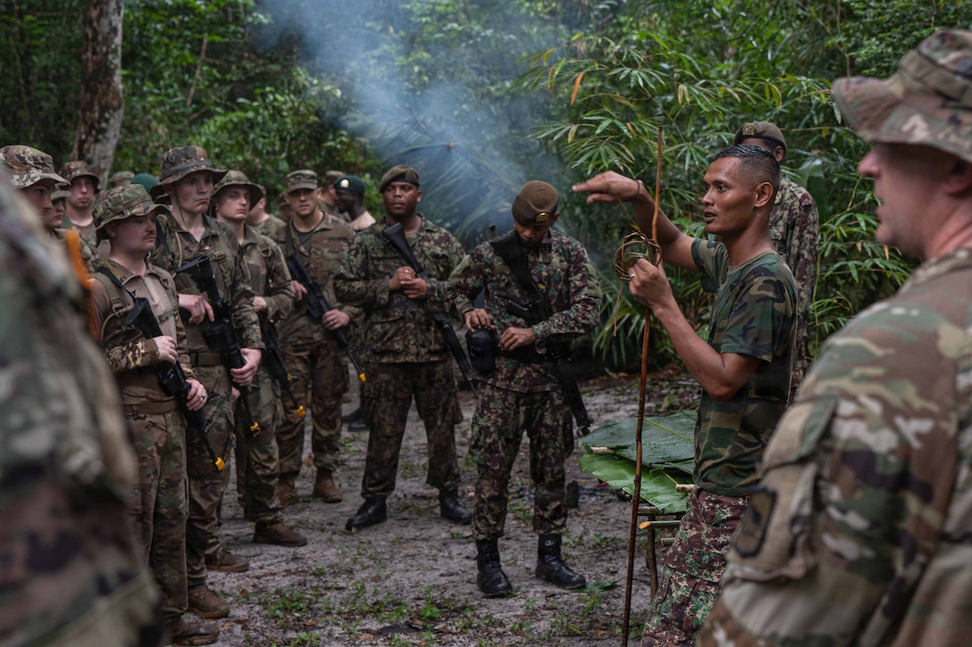 Suriname Armed Forces Sgt. First Class Alvaro Ronoreso teaches survival techniques to U.S. Soldiers and Airmen, as well as Suriname Armed Forces members, during Operation Rumble in the Jungle at Ayoko, Suriname, April 17, 2026.