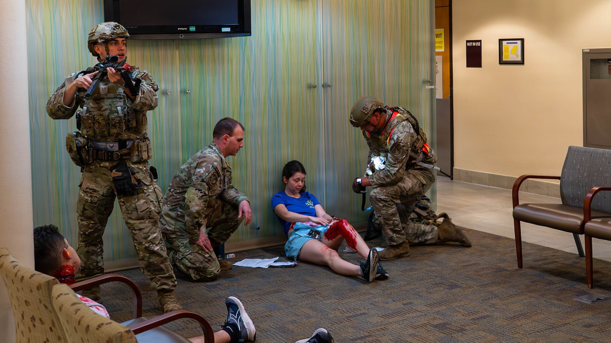 U.S. Airmen from 51st Security Forces Squadron and 51st Civil Engineer Squadron respond to a simulated active shooter scenario during exercise Mustang Rodeo at Osan Air Base, Republic of Korea, May 12, 2026. Mustang Rodeo 26-2 provides Airmen regular opportunities to rehearse targeted skill sets and strengthen contingency response capabilities under simulated operational stress. (U.S. Air Force photo by Airman 1st Class Megan Cusmano)