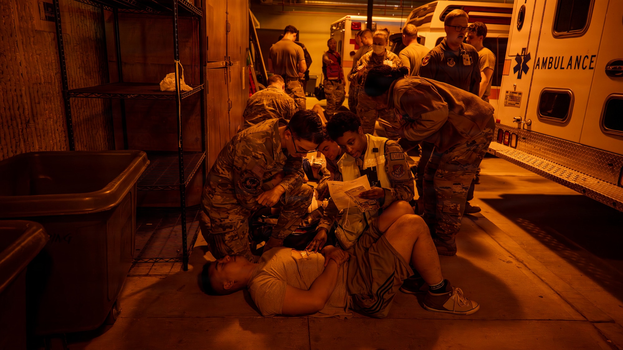 U.S. Airmen assigned to the 51st Medical Group provide care to simulated casualties during an active shooter scenario during exercise Mustang Rodeo 26-2 at Osan Air Base, Republic of Korea, May 12, 2026. Mustang Rodeo 26-2 allows units to plan and execute focused training events that reinforce the skills required to respond to crisis or conflict.  (U.S. Air Force photo by Airman 1st Class Megan Cusmano)