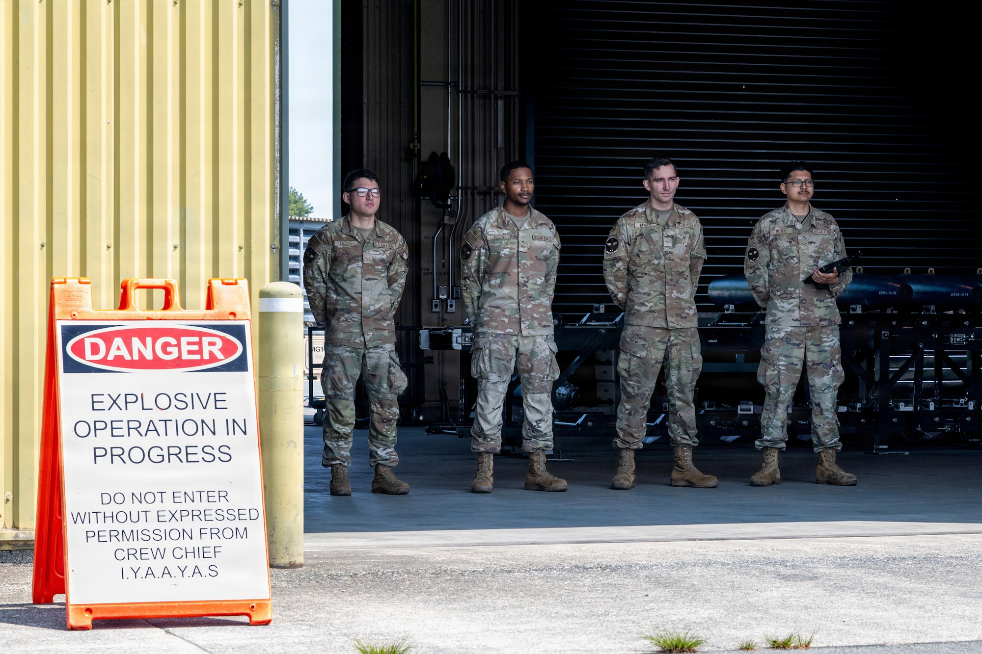 U.S. Airmen assigned to the 35th Munitions Squadron standby to brief Japan Air Self-Defense Force Airmen during an immersion tour.