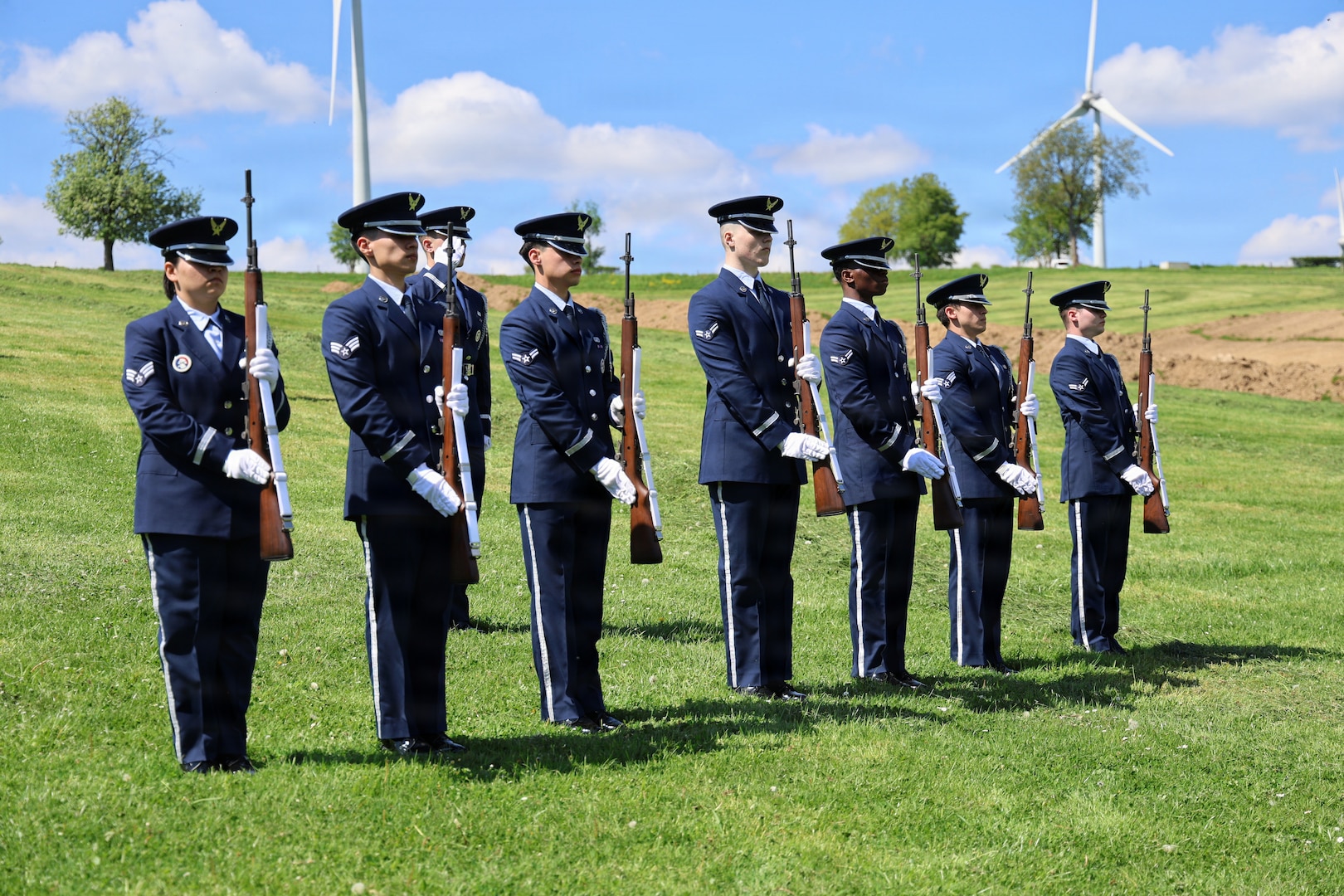 U.S. Air Force Honor Guard firing squad prepares to render a three-volley salute during the Wereth 11 Memorial Observance on May 9, 2026, in Wereth, Belgium. The ceremony honored the memory and sacrifice of the 11 African American soldiers of the 333rd Field Artillery Battalion who were captured and killed by Nazi forces during the Battle of the Bulge.