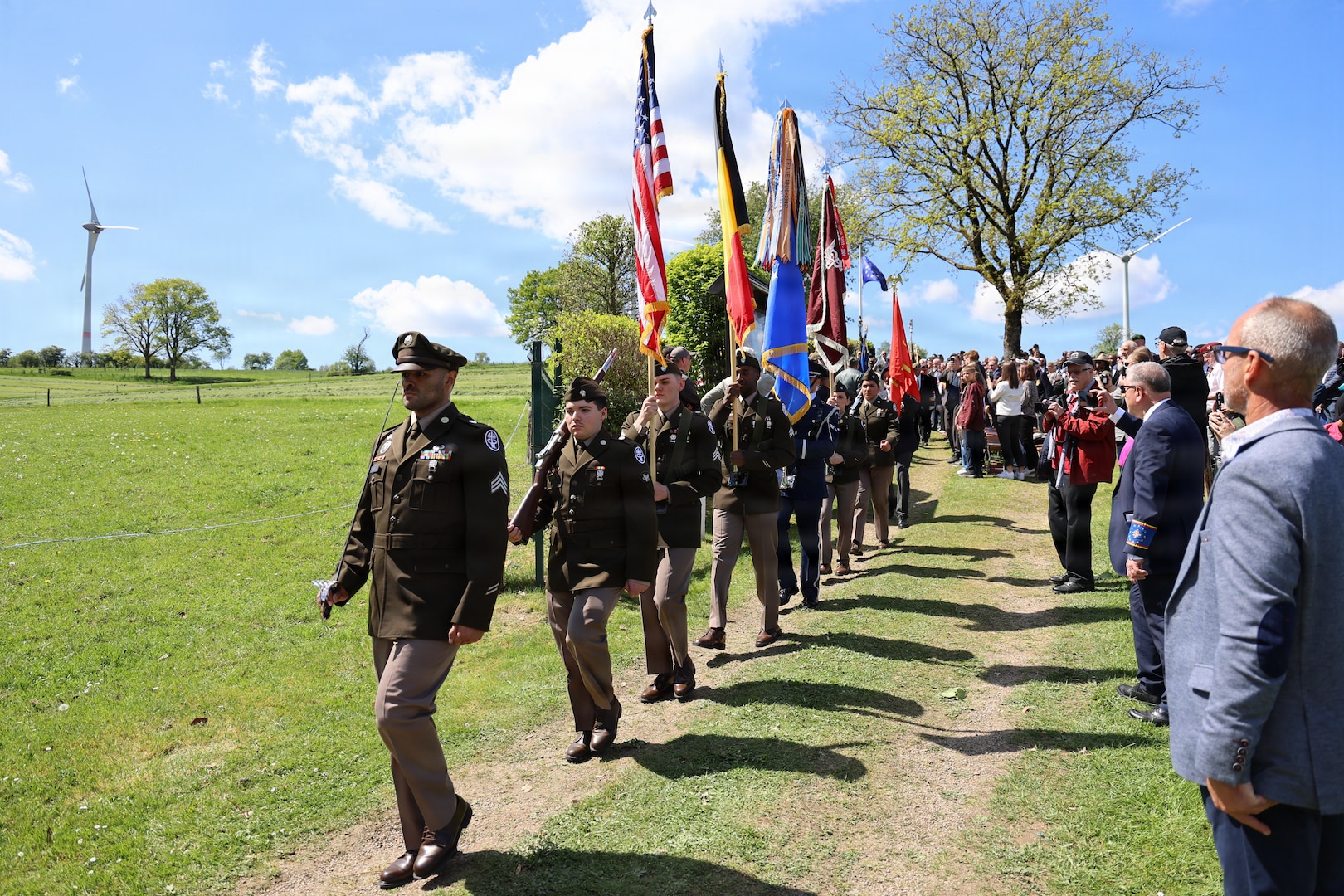 U.S. Air Force Honor Guard firing squad prepares to render a three-volley salute during the Wereth 11 Memorial Observance on May 9, 2026, in Wereth, Belgium. The ceremony honored the memory and sacrifice of the 11 African American soldiers of the 333rd Field Artillery Battalion who were captured and killed by Nazi forces during the Battle of the Bulge.
