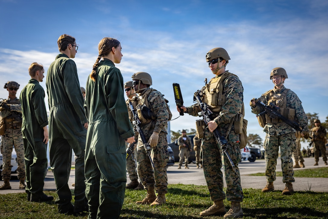 U.S. Marines with Combat Logistics Battalion 24, Combat Logistics Regiment 27, 2nd Marine Logistics Group, search Swedish Army soldier role players during evacuation control center training as part of exercise Aurora 26 in Visby, Sweden, May 9, 2026. U.S. Marines and Sailors with 2nd MLG are participating in exercise Aurora as part of the larger U.S. Army-led Sword 26 series of linked multinational exercises, which directly supports NATO's Eastern Flank Deterrence Initiative concept, validates defense plans, builds a unified lethal force, and strengthens deterrence. (U.S. Marine Corps photo by Lance Cpl. Brady V. Hathaway)