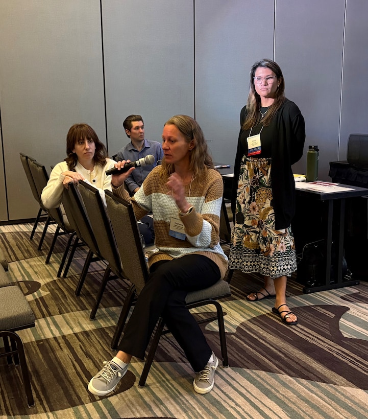 Stephanie Verhulst answers a question from the audience at the RECOVER session held on April 15, 2026 at the National Conference on Ecosystem Restoration, titled "Frameworks and Feedback Loops: RECOVER's Role in Ensuring Everglades Restoration Objectives are Met"