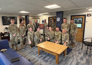 Group of Airmen pose for photo
