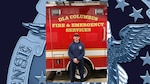 Man wearing blue ball cap and blue pants and shirt standing in front of fire truck