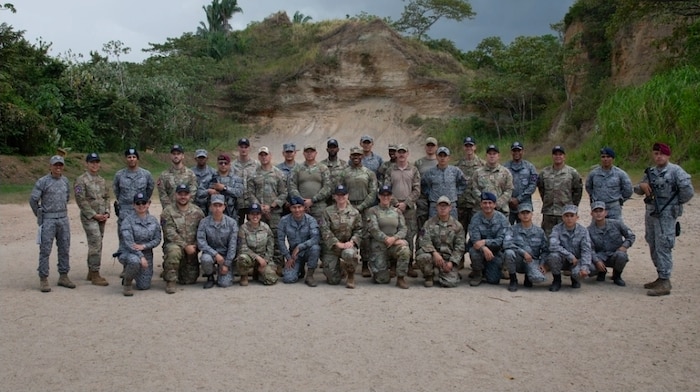 LEAP Scholars and the Relámpago de los Andes exercise mission leadership team pose with Colombian Security Forces counterparts after a relationship building/training event. LEAP Scholars filled gaps in both language and technical capabilities during the demonstration portions and interactions in the event, which was part of the Relámpago de los Andes exercise.