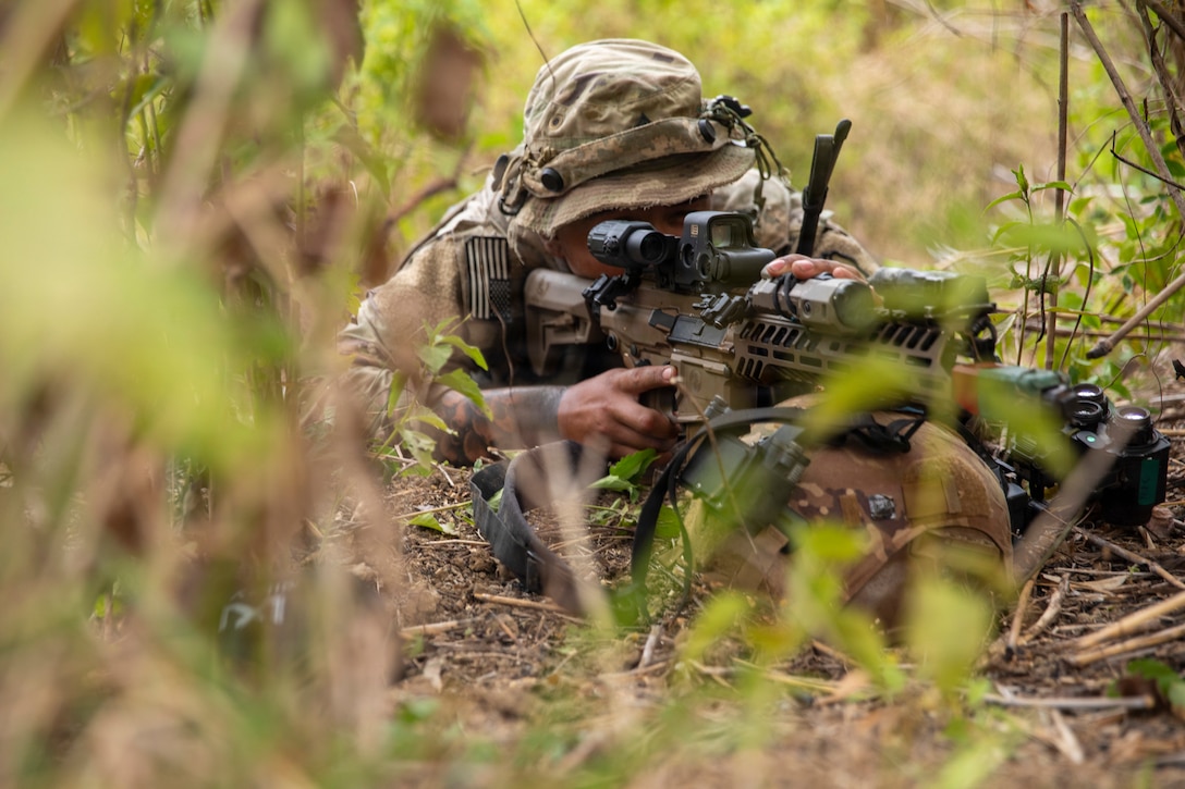 U.S. Army Sgt. Jozeph Alvarez, an indirect fire infantryman assigned to 2nd Battalion, 35th Infantry Regiment, 3rd Mobile Brigade, 25th Infantry Division, pulls security, while, his team establishes a mortar site during the Joint Pacific Readiness Center Exportable Exercise at Laur, Philippines, May 12, 2026.