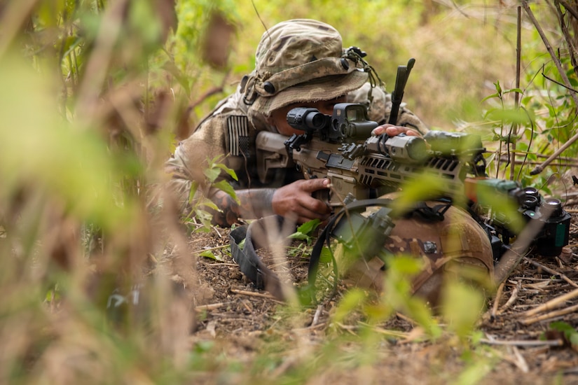U.S. Army Sgt. Jozeph Alvarez, an indirect fire infantryman assigned to 2nd Battalion, 35th Infantry Regiment, 3rd Mobile Brigade, 25th Infantry Division, pulls security, while, his team establishes a mortar site during the Joint Pacific Readiness Center Exportable Exercise at Laur, Philippines, May 12, 2026.
