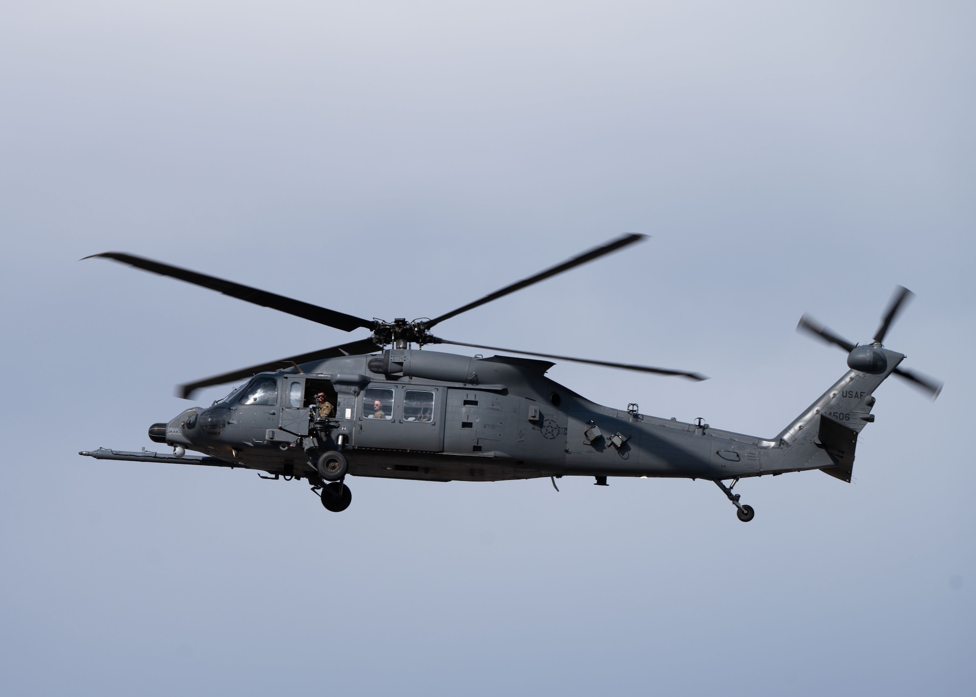 U.S. Air Force Col. Charles Redmond, 355th Wing deputy commander, pilots an HH-60W aircraft at Davis-Monthan Air Force Base, Arizona, May 12, 2026. Redmond completed his “fini flight,” a tradition that honors the pilot's service, that afternoon. (U.S. Air Force photo by Airman Najzee Kuzu)