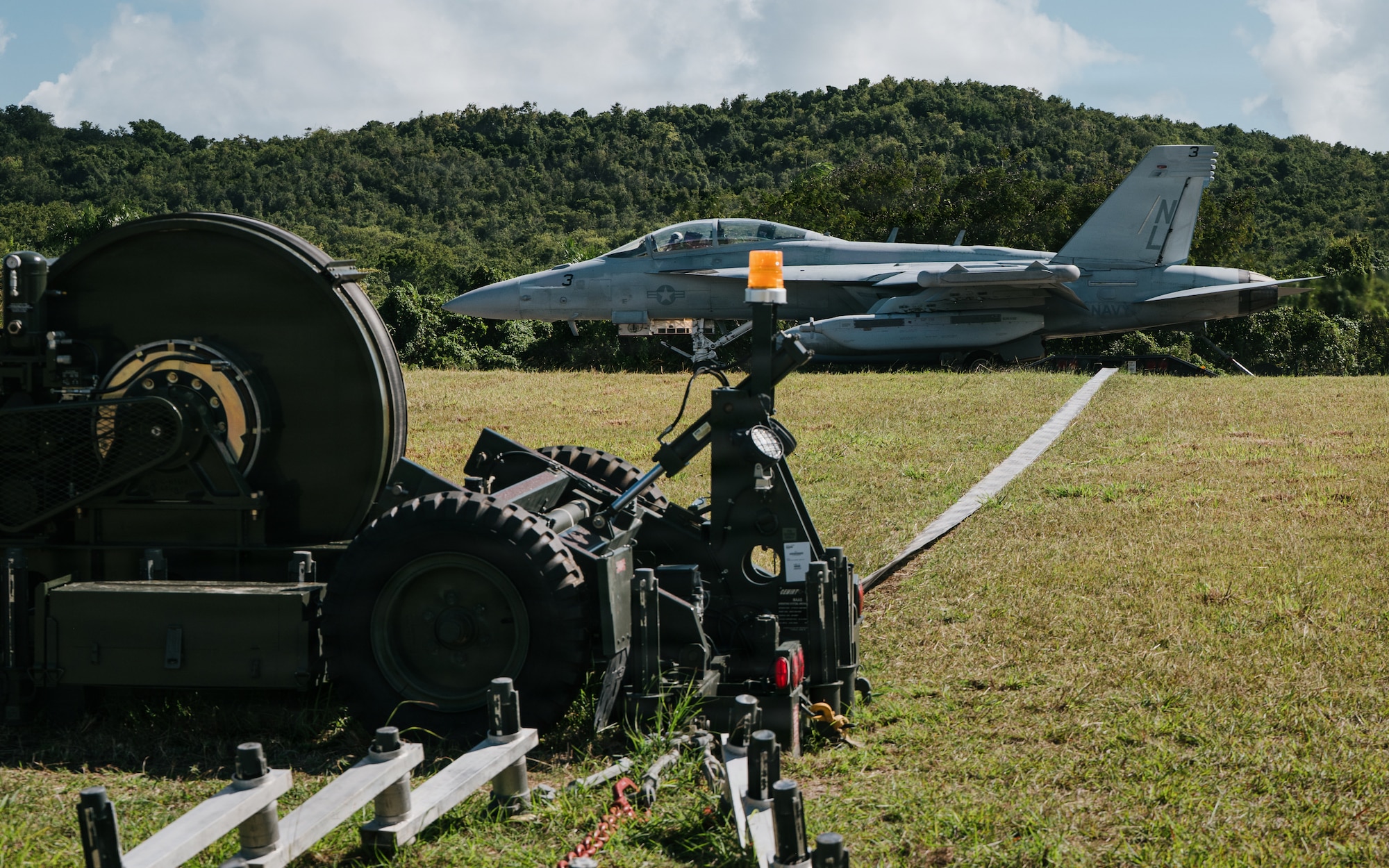 airmen use power tools
