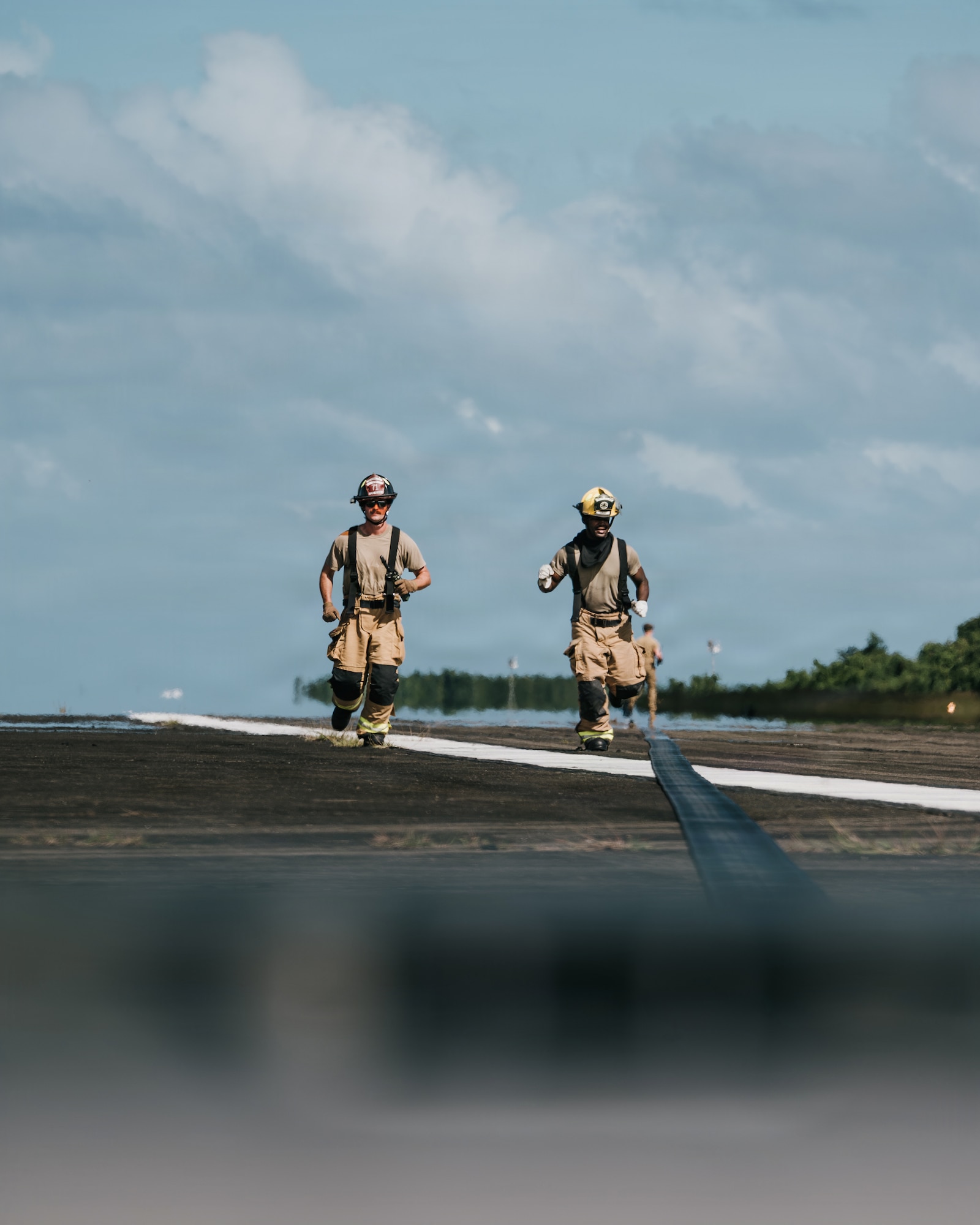airmen use power tools