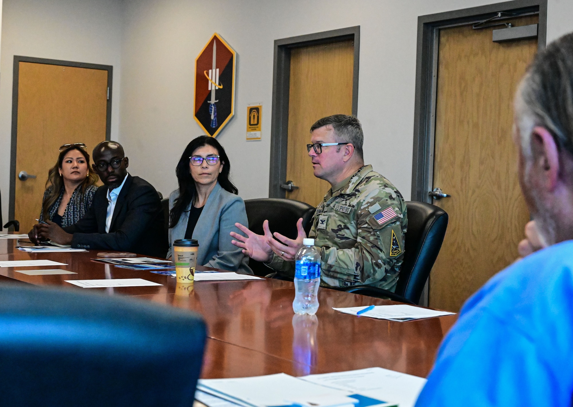 U.S. Space Force Col. Andrew Dermanoski, commander of Space Base Delta 3, leads a discussion during a base visit at Los Angeles Air Force Base, Calif., May 11, 2026. The dialogue emphasized the need for collaboration between the base and regional partners to empower the force and support the region in its critical role in the national space enterprise and national defense. (U.S. Space Force photo by Capt. Michelle Chang)