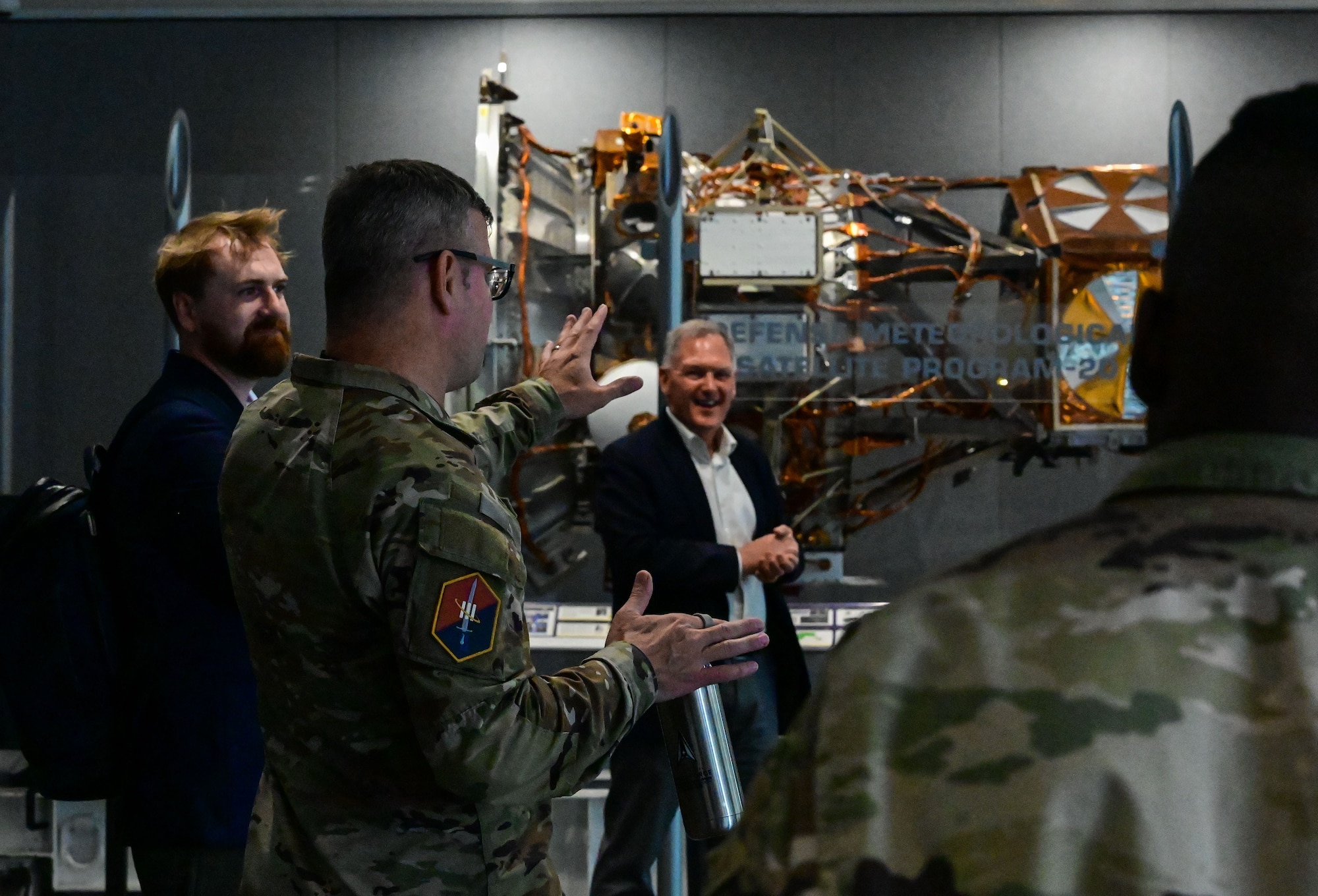 U.S. Space Force Col. Andrew Dermanoski, commander of Space Base Delta 3, speaks during a tour at Los Angeles Air Force Base, Calif., May 11, 2026. Local civic and aerospace leaders visited the base to foster strategic partnerships and align efforts to develop the workforce, build resilient infrastructure and emphasize the vital role of the aerospace industry in both the regional economy and national defense. (U.S. Space Force photo by Capt. Michelle Chang)