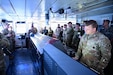 Participants in the Senior Enlisted Leaders Forum, part of the Land Forces Pacific Symposium and Exposition, receive a brief on the capabilities of a Logistics Support Vessel on May 12, 2026, at Joint Base Pearl Harbor Hickam.