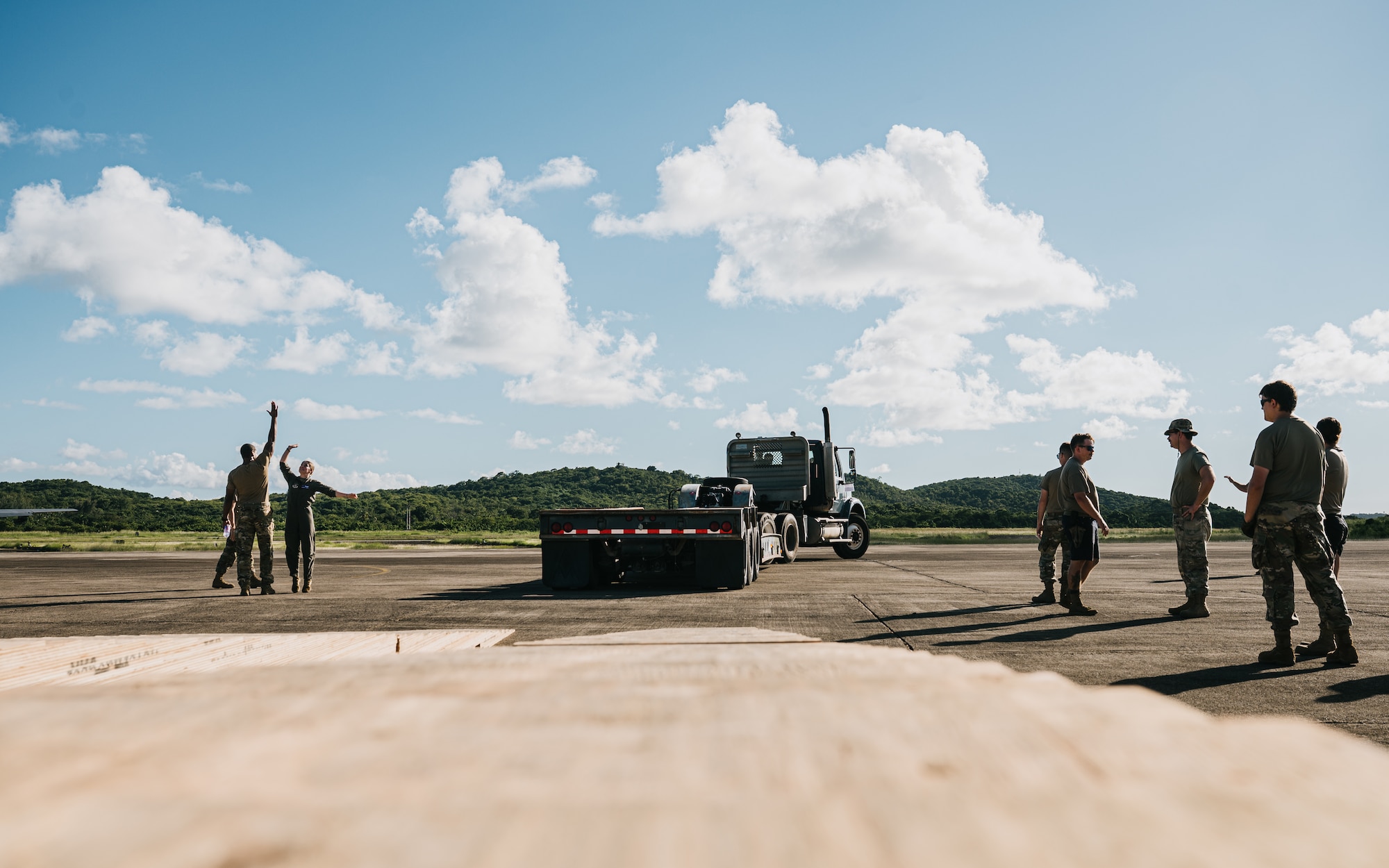 airmen use power tools