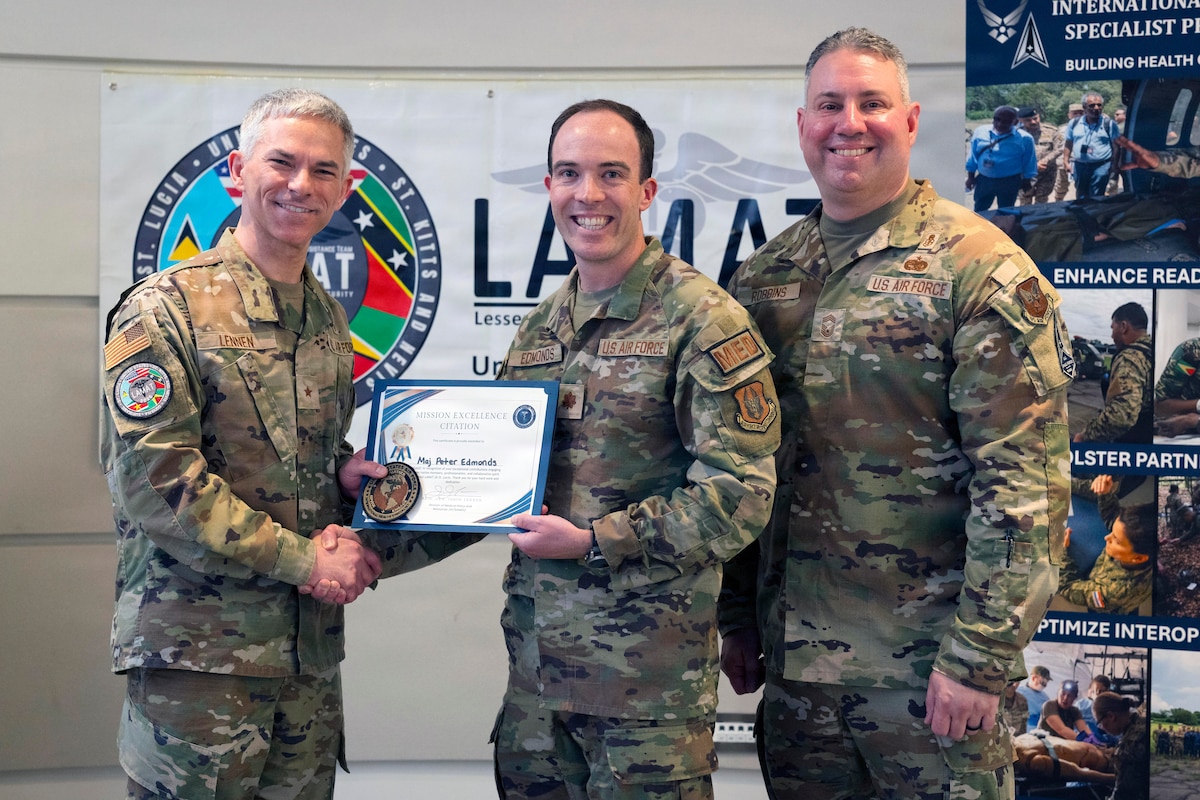 Image of Airmen posing for a photo.