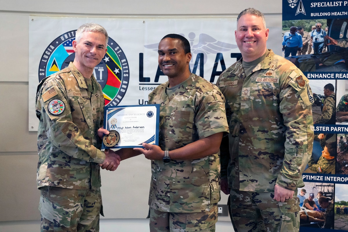 Image of Airmen posing for a photo.