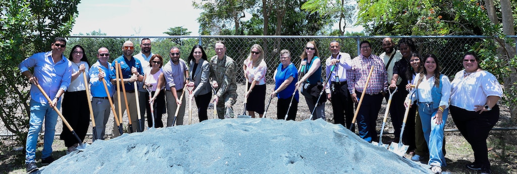 Members of the Army Corps of Engineers Caribbean District Team who have worked on the Caño Martín Peña Ecosystem Restoration Project in San Juan, participate in the ceremonial groundbreaking for Contract 3 Phase 1 of the project. The milestone event marked the beginning of full dredging operations and continued progress toward restoring the 2.2 mile channel and surrounding ecosystems.