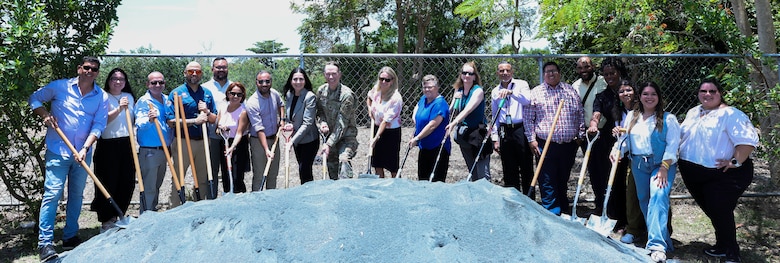 Members of the Army Corps of Engineers Caribbean District Team who have worked on the Caño Martín Peña Ecosystem Restoration Project in San Juan, participate in the ceremonial groundbreaking for Contract 3 Phase 1 of the project. The milestone event marked the beginning of full dredging operations and continued progress toward restoring the 2.2 mile channel and surrounding ecosystems.