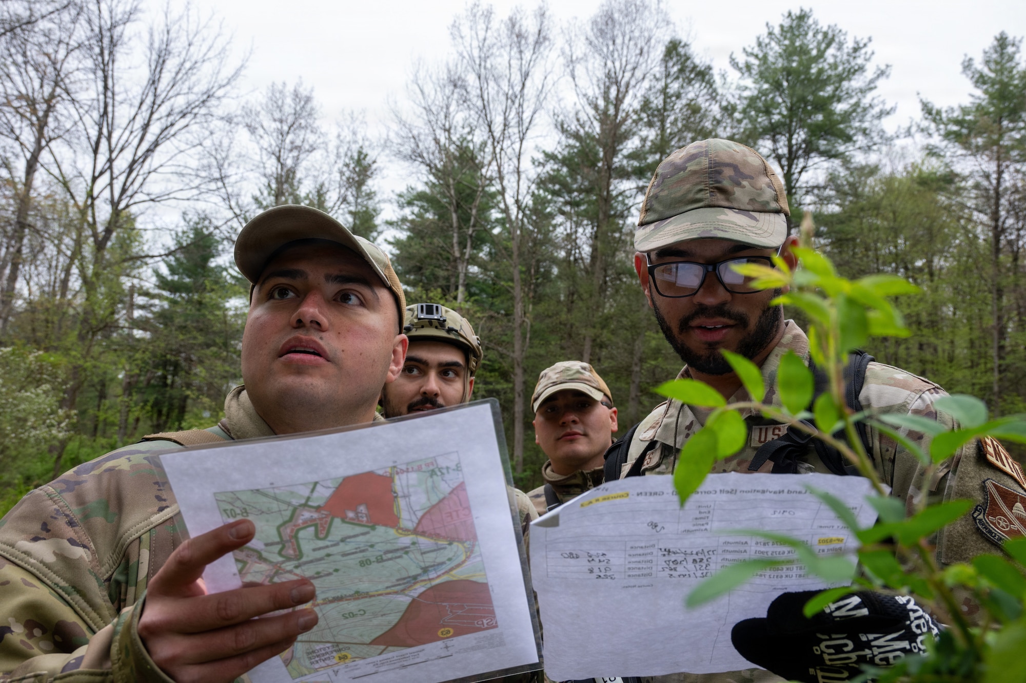 Photo of Airmen doing land navigation