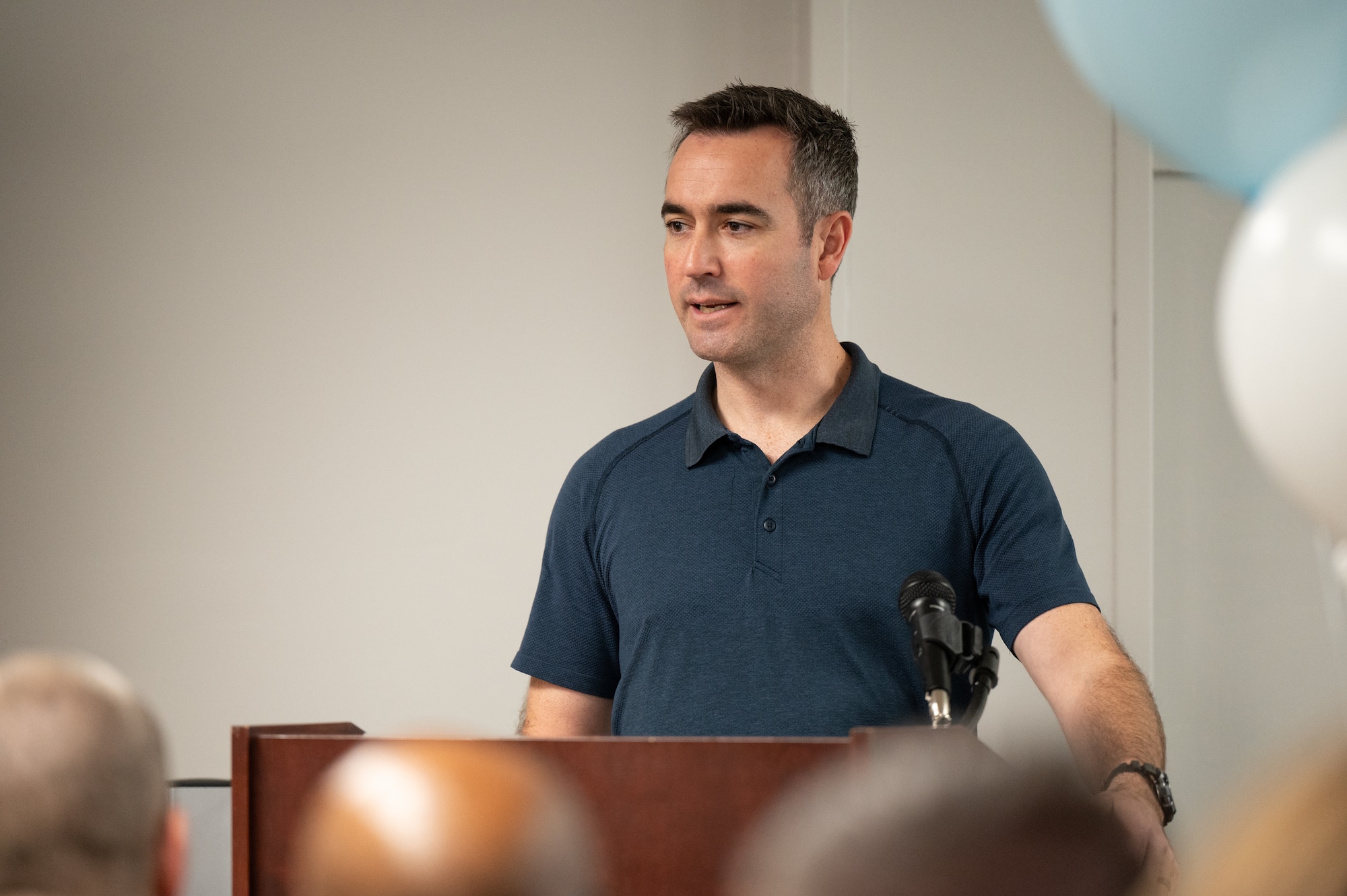 Retired U.S. Air Force Maj. Brendan Crawford, thanks his family for their support in establishing Courtney’s Cove at Joint Base McGuire-Dix-Lakehurst, N.J., April 2, 2026.