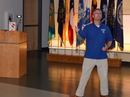 AMLC safety and occupational health manager addresses workforce at safety stand-down event.