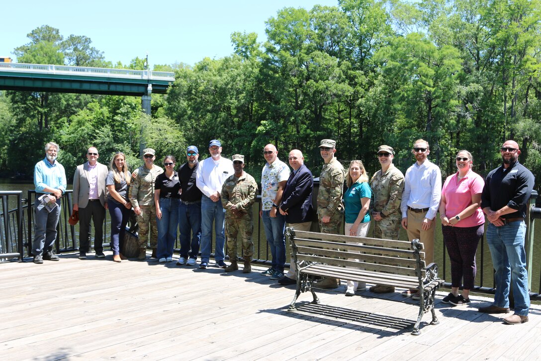 A large group of people standing for a group photo.