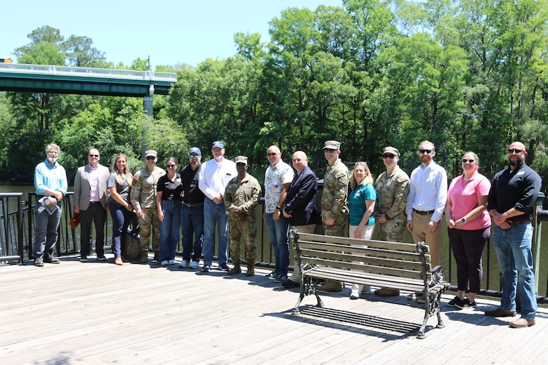 A large group of people standing for a group photo.