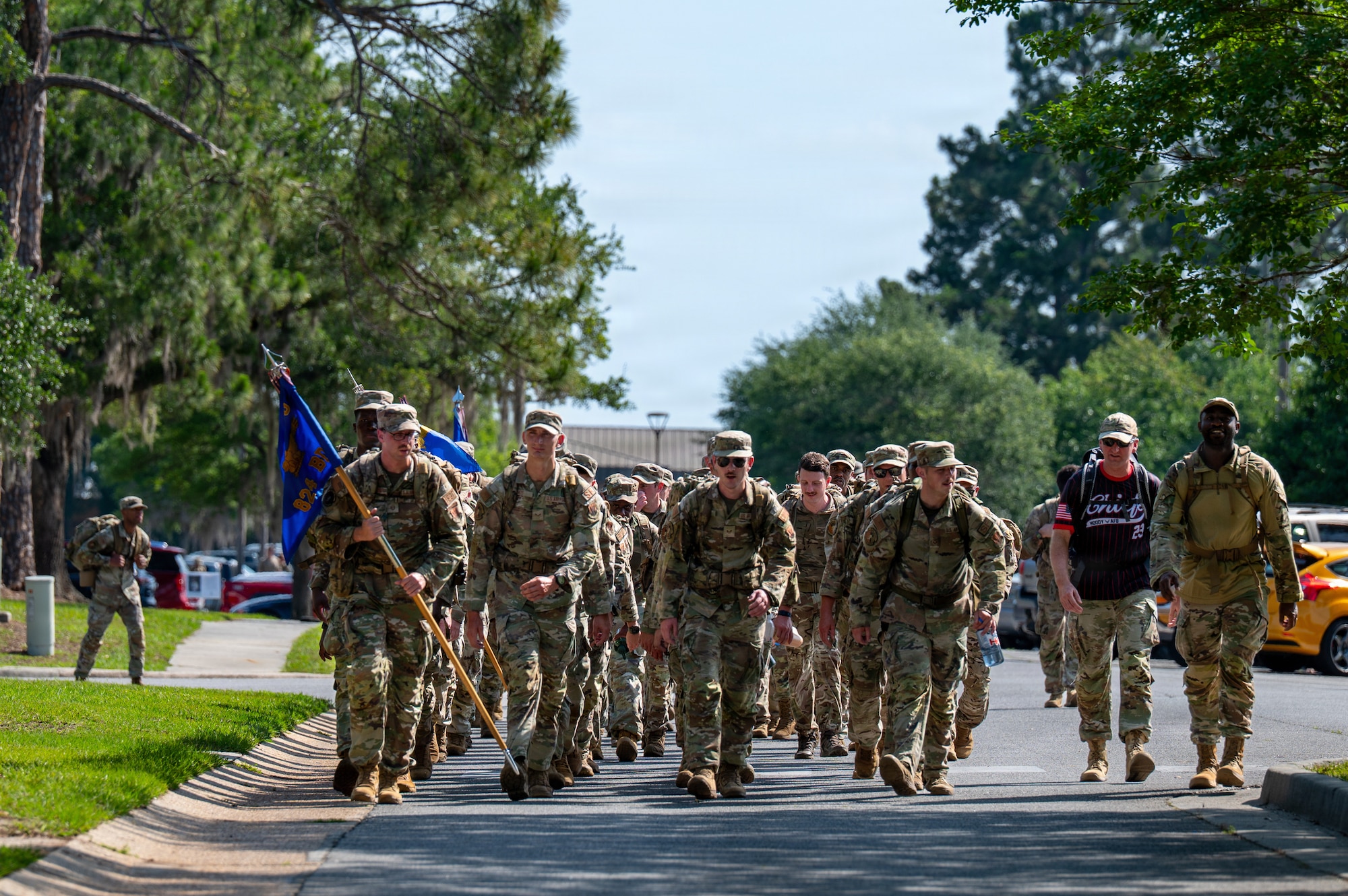 U.S. Airmen assigned to the 824th Base Defense Squadron reach the end of the National Police Week memorial ruck at Moody Air Force Base, Georgia, May 11, 2026. The ruck march was held in observance of National Police Week to honor fallen law enforcement officers and recognize the service and sacrifice of those who protect their communities. (U.S. Air Force photo by Airman 1st Class Rachel Howell)