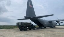 Airmen assigned to the 733d Air Mobility Squadron load cargo onto a C-130J Super Hercules aircraft during Exercise Balikatan 2026 at Cagayan North International Airport, Philippines, April 21, 2026.